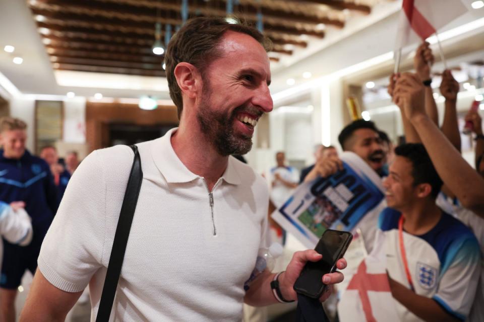 The England players are welcomed back to their hotel after beating Senegal (@England)