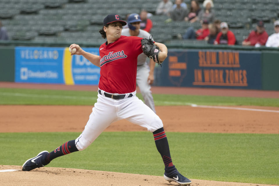 Cleveland Guardians starting pitcher Cal Quantrill delivers against the Texas Rangers during the first inning of the first game of a baseball doubleheader in Cleveland, Tuesday, June 7, 2022. (AP Photo/Phil Long)