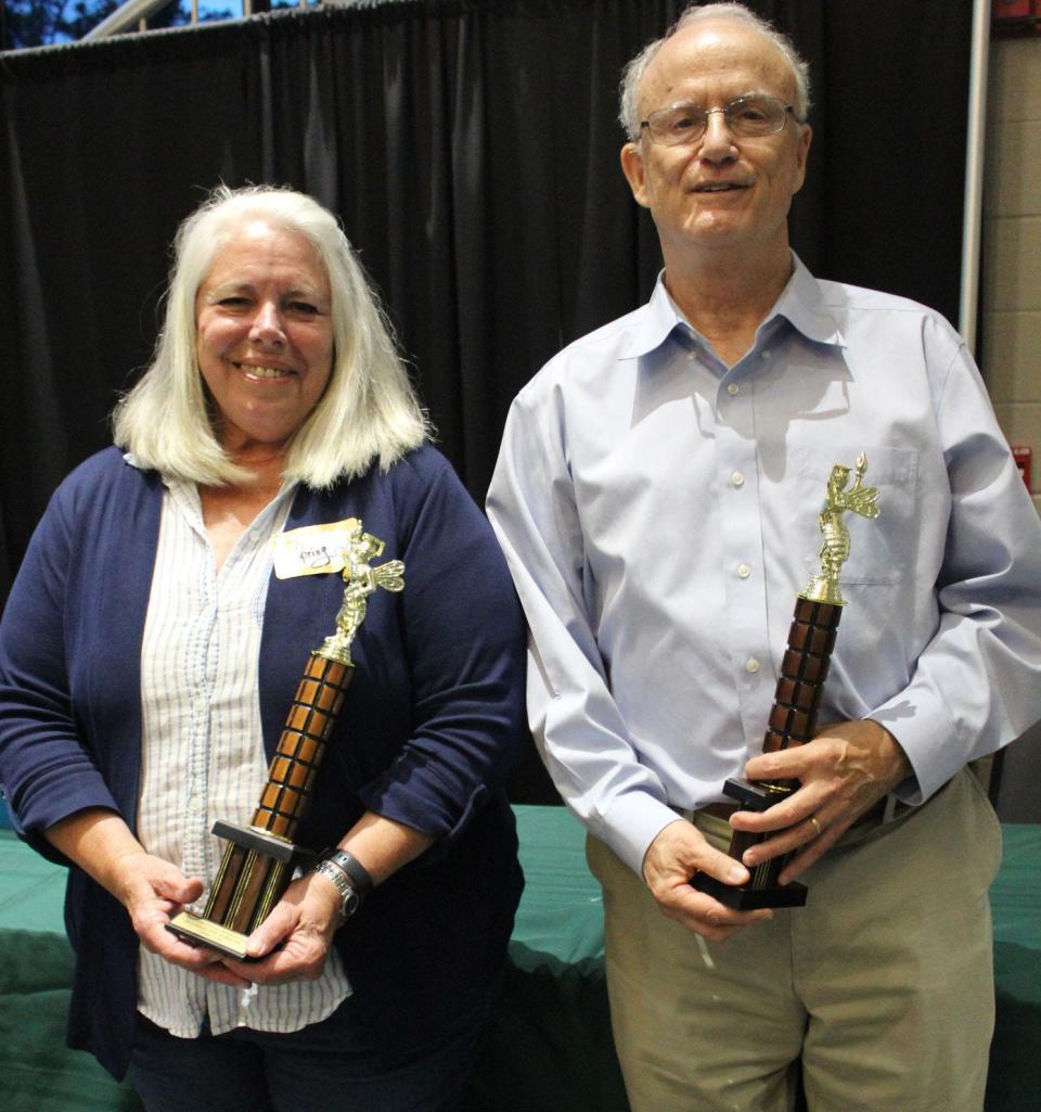 Spring Harkins and Bill Chase were the winners of the 32nd annual Adult Spelling Bee that raises money for Brunswick County Literacy Council.