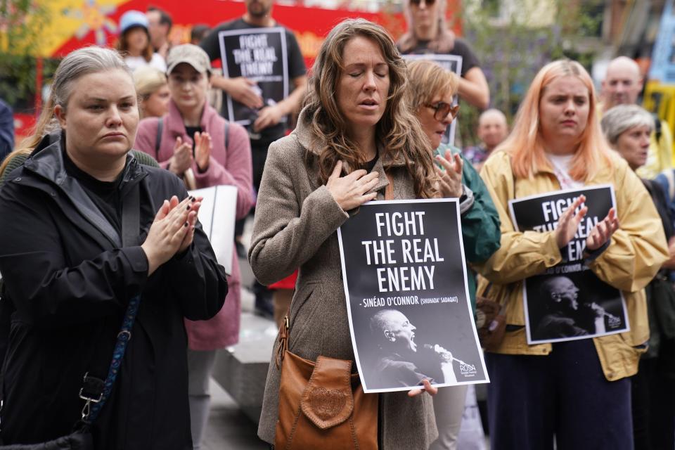 Fans at Barnardo Square sing in memory of Sinead O’Connor, who died aged 56 (Brian Lawless/PA) (PA Wire)