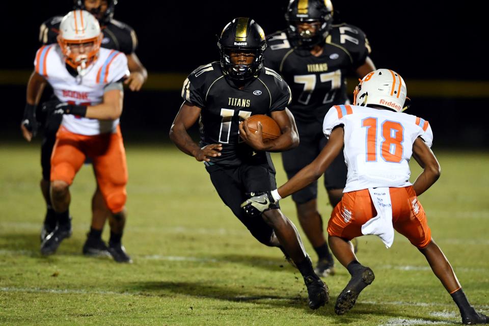 Treasure Coast High School played Boone High School on Friday, Nov. 19, 2021, in a Region 2-8A semifinal football game at the South County Regional Stadium in Port St. Lucie. The Titans dominated the game, winning 51-19 to advance to the region final against Palm Beach Central.