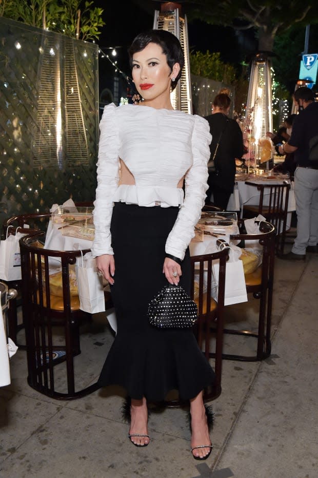 Chiu, wearing a Khaite top, Alexandre Vauthier skirt, Amina Muaddi shoes and a Vivienne Westwood bag, at Kathy Hilton's birthday party, styled by Dani Michelle.