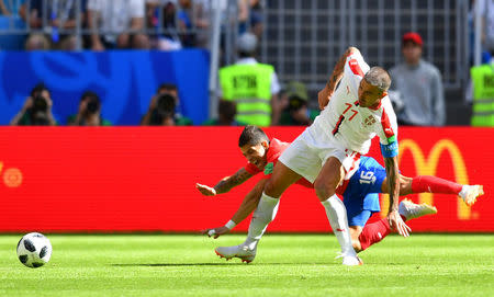 Soccer Football - World Cup - Group E - Costa Rica vs Serbia - Samara Arena, Samara, Russia - June 17, 2018 Serbia's Aleksandar Kolarov in action with Costa Rica's Cristian Gamboa REUTERS/Dylan Martinez