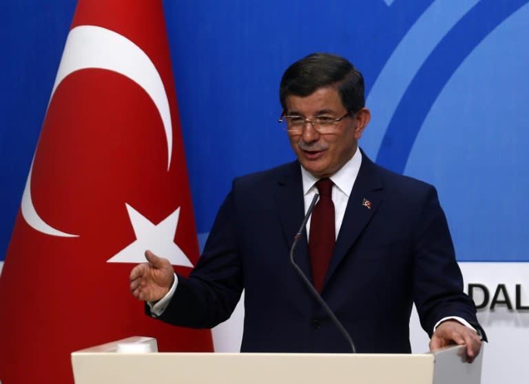 Turkish Prime Minister and leader of Turkey's ruling party, the Justice and Development Party (AK Party) Ahmet Davutoglu gives a press conference after an executive board meeting of his Justice and Development Party in Ankara, on May 5, 2016
