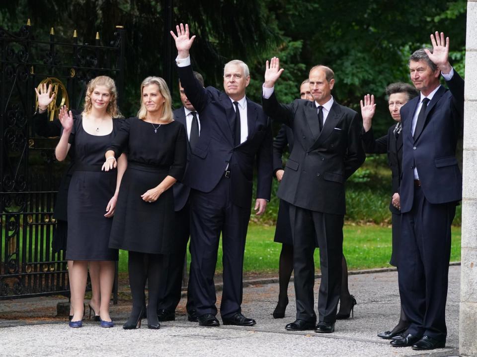 (Left-right) Lady Louise Windsor, the Countess of Wessex, Peter Phillips (hidden), the Duke of York, Zara Tindall (hidden), the Earl of Wessex, the Princess Royal and Vice Admiral Timothy Laurence wave to well-wishers outside Balmoral (Owen Humphreys/PA) (PA Wire)
