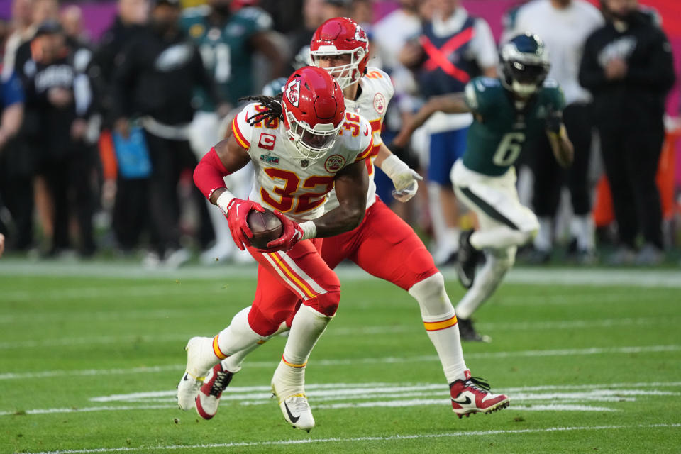 Feb 12, 2023; Glendale, Arizona, US; Kansas City Chiefs linebacker Nick Bolton (32) recovers a fumble and runs for a touchdown Philadelphia Eagles quarterback <a class="link " href="https://sports.yahoo.com/nfl/players/32723/" data-i13n="sec:content-canvas;subsec:anchor_text;elm:context_link" data-ylk="slk:Jalen Hurts;sec:content-canvas;subsec:anchor_text;elm:context_link;itc:0">Jalen Hurts</a> (1) in the second quarter of Super Bowl LVII at State Farm Stadium. Mandatory Credit: Joe Camporeale-USA TODAY Sports