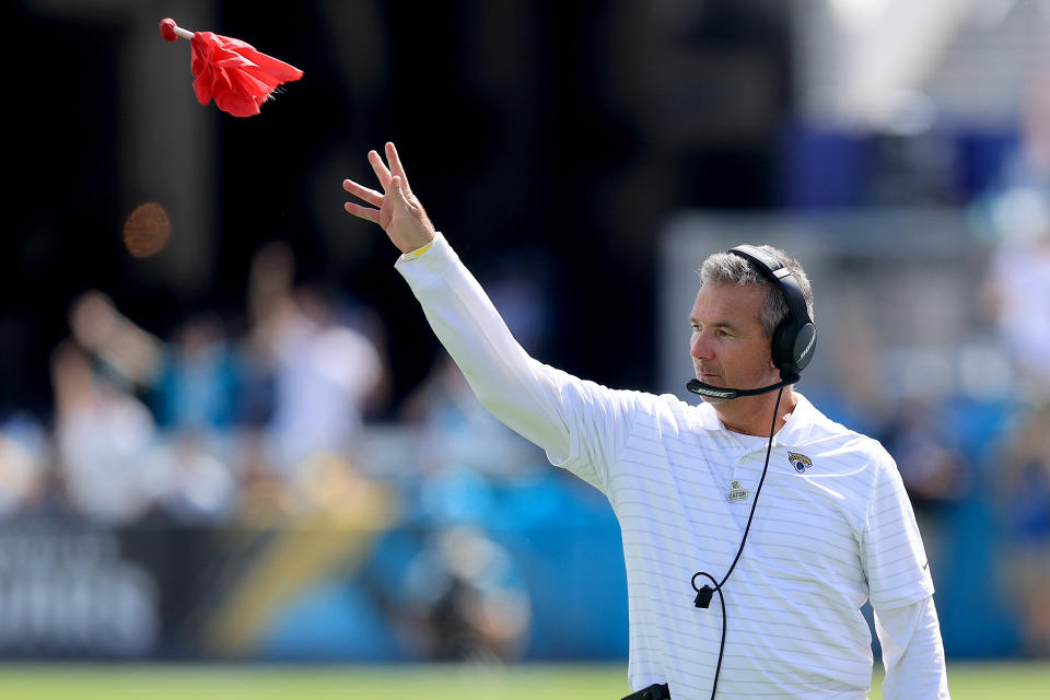 JACKSONVILLE, FLORIDA - OCTOBER 10: Head coach Urban Meyer of the Jacksonville Jaguars throws the red challenge flag during the game against the Tennessee Titans at TIAA Bank Field on October 10, 2021 in Jacksonville, Florida. (Photo by Sam Greenwood/Getty Images)