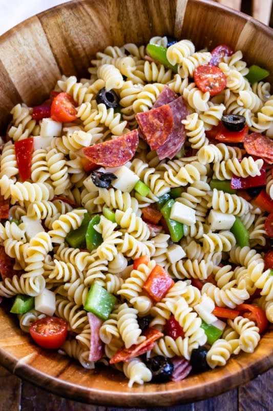 <p>Crazy for Crust</p><p>Easy Italian pasta salad is an easy side dish for any potluck. This simple pasta salad recipe has fresh vegetables, olives, pepperoni and salami and a Italian dressing that makes it the perfect summer salad.</p><p><strong>Get the recipe: <a href="https://www.crazyforcrust.com/easy-italian-pasta-salad-recipe/" rel="nofollow noopener" target="_blank" data-ylk="slk:Easy Italian Pasta Salad;elm:context_link;itc:0;sec:content-canvas" class="link ">Easy Italian Pasta Salad</a></strong></p>