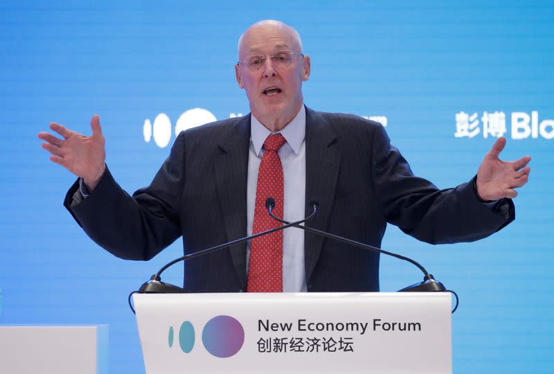 FILE PHOTO: Former U.S. Treasury Secretary Henry Paulson speaks at the 2019 New Economy Forum in Beijing