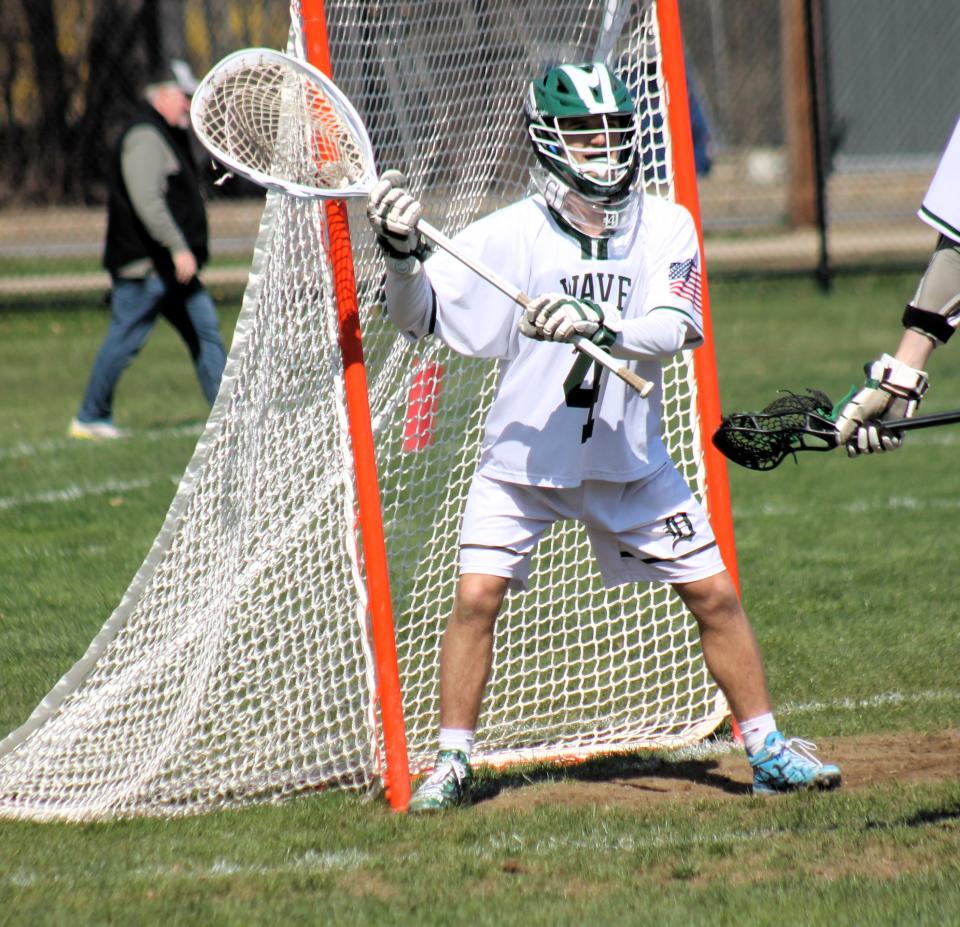 History awaits Dover goalie Dom Chalifour during Wednesday's game against Bedford in which he recorded his state record 700th save.