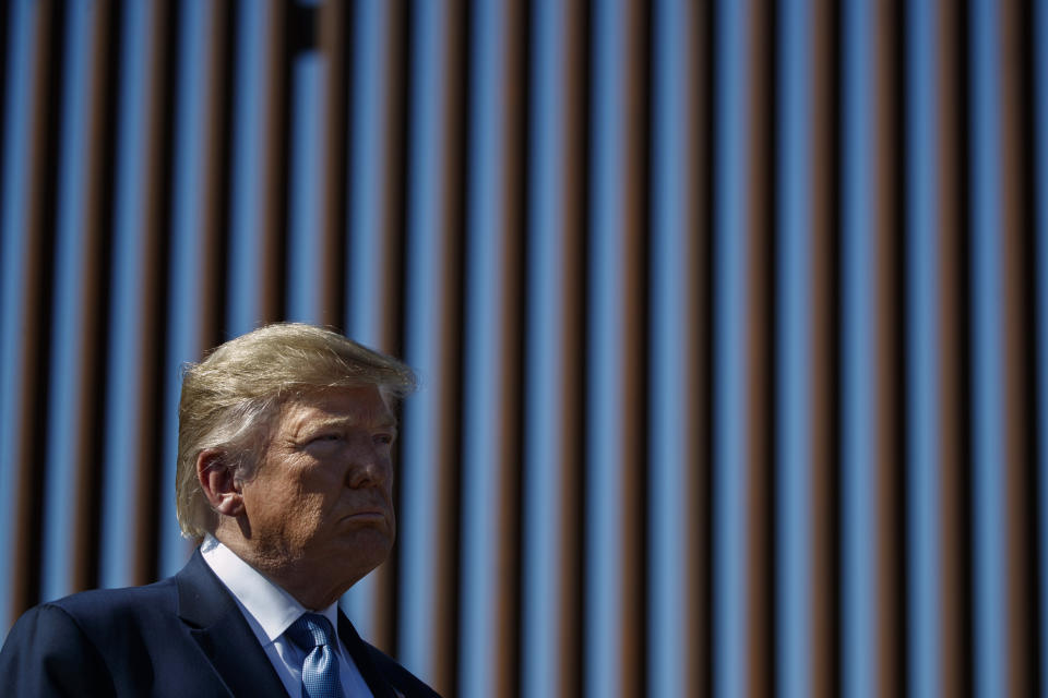 President Donald Trump tours a section of the southern border wall, Wednesday, Sept. 18, 2019, in Otay Mesa, Calif. (AP Photo/Evan Vucci)