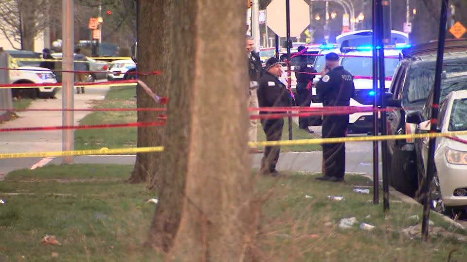 Police work the scene where Dexter Reed was shot March 21 in Chicago's Garfield Park neighborhood. - WLS