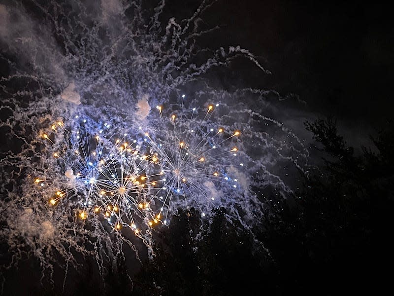 Purple and yellow fireworks at Disney World