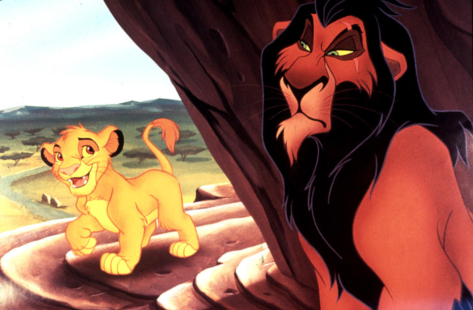 Simba and Scar from The Lion King standing on a rock, with Simba looking happy and Scar appearing serious