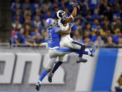 <p>Los Angeles Rams wide receiver Robert Woods, defended by Detroit Lions cornerback Darius Slay (23), makes a catch during the first half of an NFL football game, Sunday, Dec. 2, 2018, in Detroit. (AP Photo/Paul Sancya) </p>