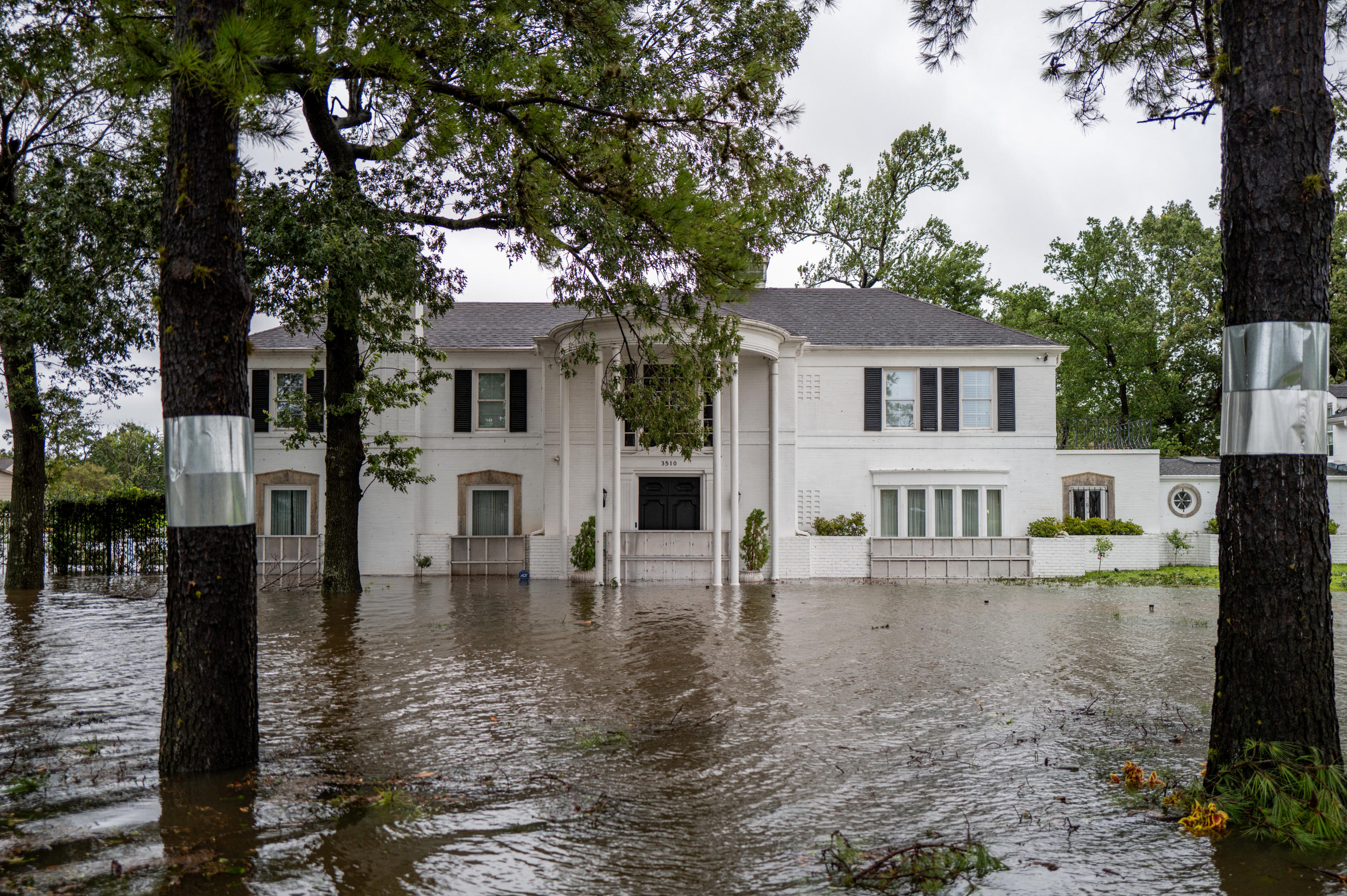 A home is surrounded by floodwaters in Houston on Monday. 