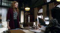 <p>Also in Season 3, Washington often sat or stood behind objects, like when Olivia is working behind this desk. (Credit: ABC) </p>