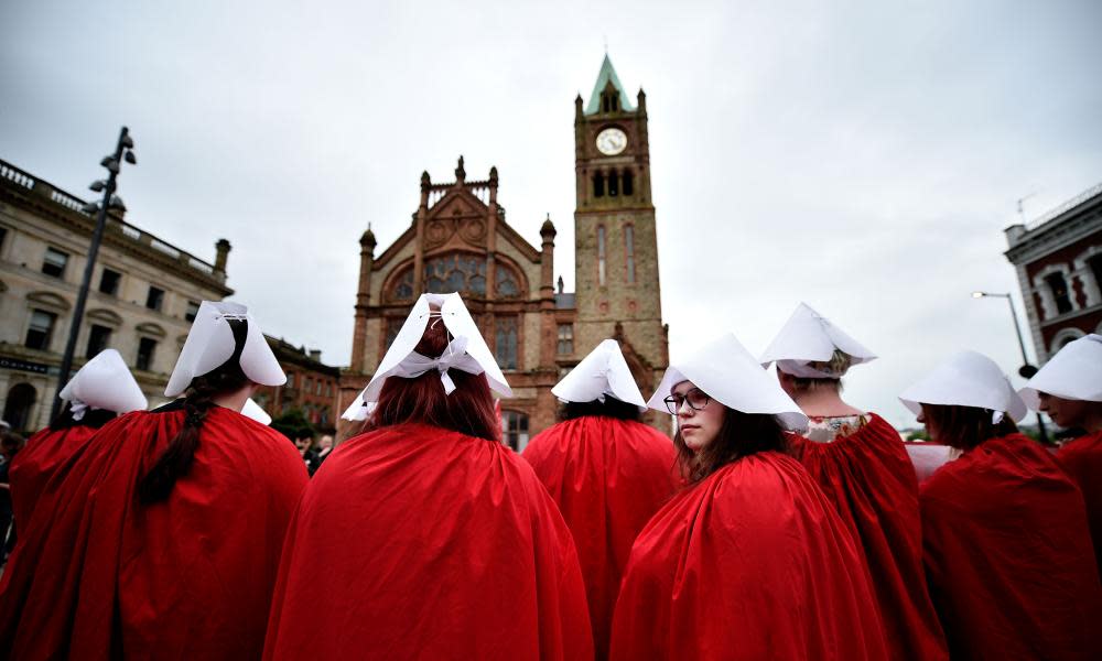 Pro-choice activists dressed as handmaidens protest in Derry