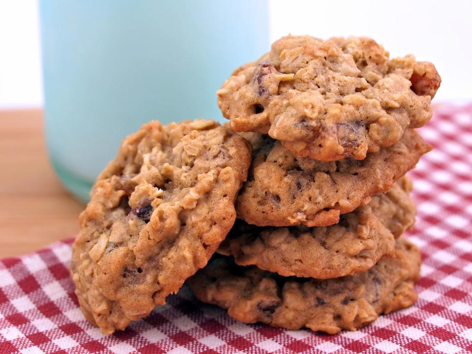 <p>Need a cookie, like, now? Whip up a batch of easy oatmeal cookies to satisfy your craving in a super healthy way. "I would recommend making homemade oatmeal cookies using raw oats, and nuts," Jamie Hickey, certified personal trainer and nutritionist, and founder of <a href="https://truismfitness.com/" rel="nofollow noopener" target="_blank" data-ylk="slk:Truism Fitness;elm:context_link;itc:0" class="link ">Truism Fitness</a>, tells Delish. This gives you a snack high in fiber, protein, and healthy fats. And, you know, it's really good. </p>