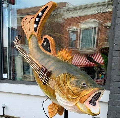 "Four String Bass" by Pat Webster stood outside Dancing Bear on North Third Avenue as one of 27 artist-reimagined bass sculptures throughout downtown in Destination Sturgeon Bay's "Bass Around the Bay" 2023 street art project. The 27 pieces of bass art are on an online auction as one of the highlights of Sturgeon Bay's annual Harvest Fest on Sept. 16.