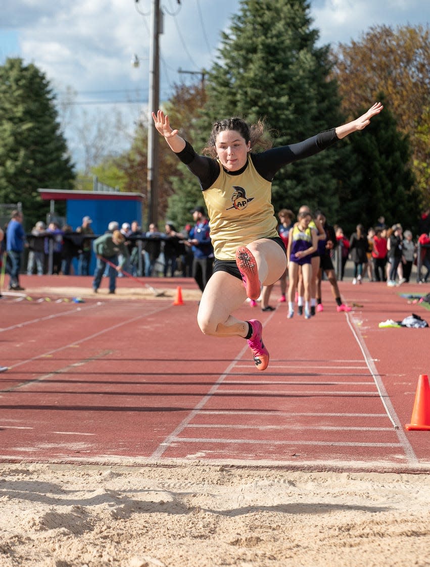 Avoca-Prattsburgh's Olivia Kilmer flies through the air during the long jump at the Hornell Invitational.