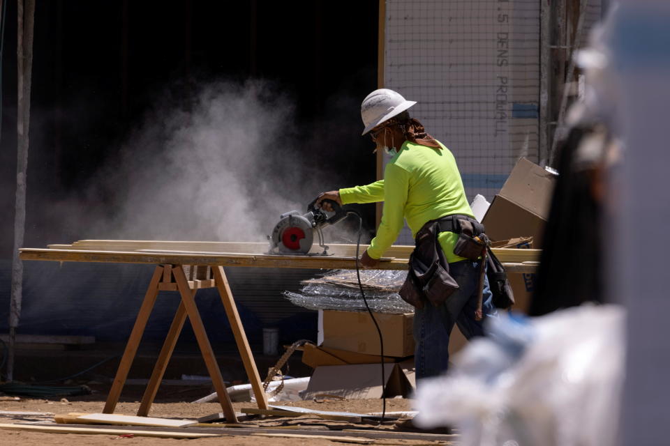 Residential single family homes construction by KB Home are shown under construction in the community of Valley Center, California, U.S. June 3, 2021.   REUTERS/Mike Blake