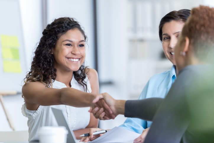 A financial advisor working with clients to create a financial plan.