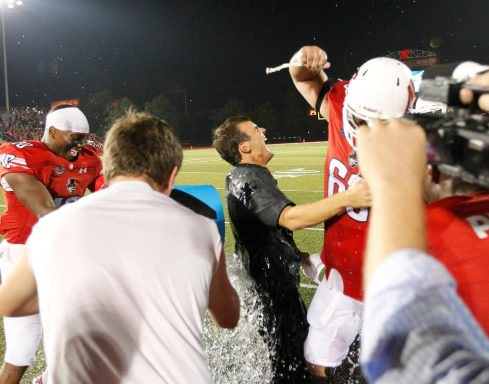 Austin Peay coach Will Healy got doused by his players after their losing streak was snapped in a win over Morehead State in 2017.(Robert Smith/Austin Peay)