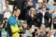Spain's Rafael Nadal celebrates with the cup after defeating Norway's Casper Ruud in their final match of the French Open tennis tournament at the Roland Garros stadium Sunday, June 5, 2022 in Paris. Nadal won 6-3, 6-3, 6-0. (AP Photo/Jean-Francois Badias)