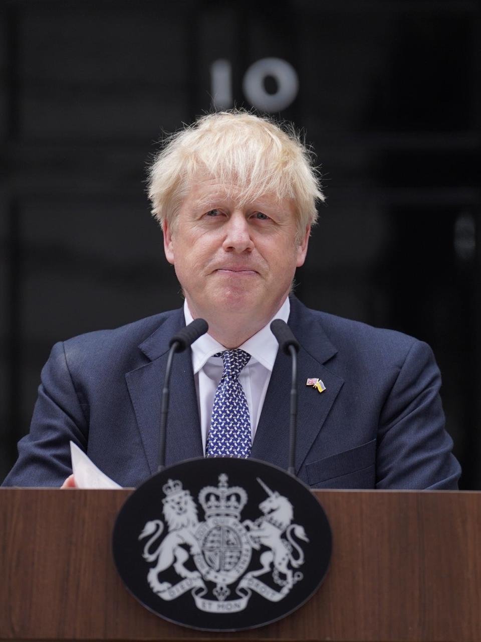 Prime Minister Boris Johnson reads a statement outside 10 Downing Street formally resigning as Conservative Party leader (Stefan Rousseau/PA) (PA Wire)