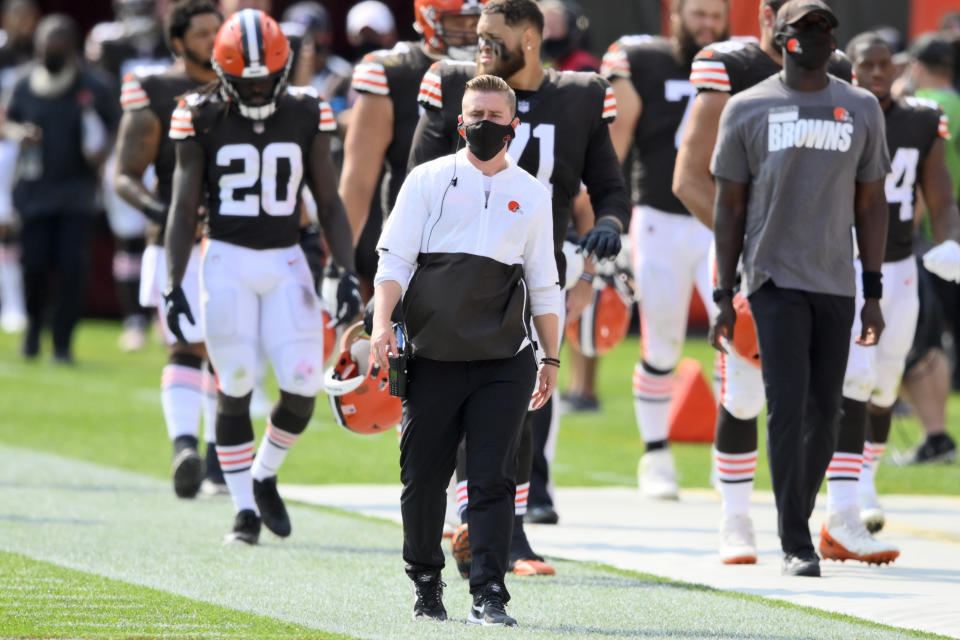 Cleveland Browns chief of staff Callie Brownson, center, watches during the first half of an NFL football game against the Washington Football Team, Sunday, Sept. 27, 2020, in Cleveland. (AP Photo/David Richard)