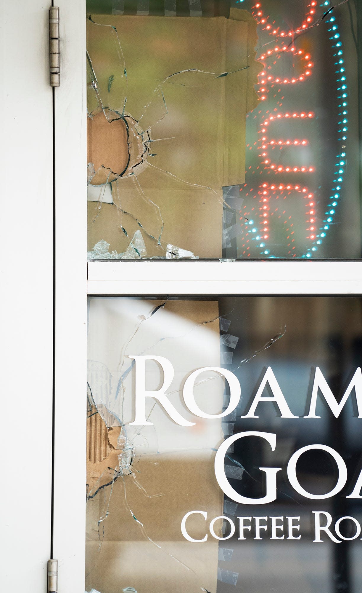 Broken windows at Roaming Goat Coffee Roasters from the May 5 shootings in the Short North. In a city plagued by gun violence, the Short North neighborhood — known for its art galleries and eclectic night life — has been no exception.