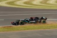 <p>Mercedes' Finnish driver Valtteri Bottas steers his car during the qualifying session for the Formula One British Grand Prix at the Silverstone motor racing circuit in Silverstone, central England on August 1, 2020.</p>