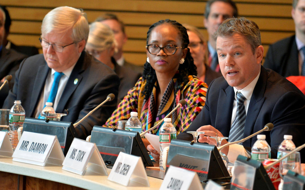 Actor and social activist Matt Damon (R) promotes his organization for universal clean water and sanitation, as former Australian Prime Minister Kevin Rudd (L) and Swaziland's Minister of Natural Resources and Energy Jabulile Mashwama listen, as part of the IMF and World Bank's 2017 Annual Spring Meetings, in Washington, U.S., April 20, 2017.                   REUTERS/Mike Theiler