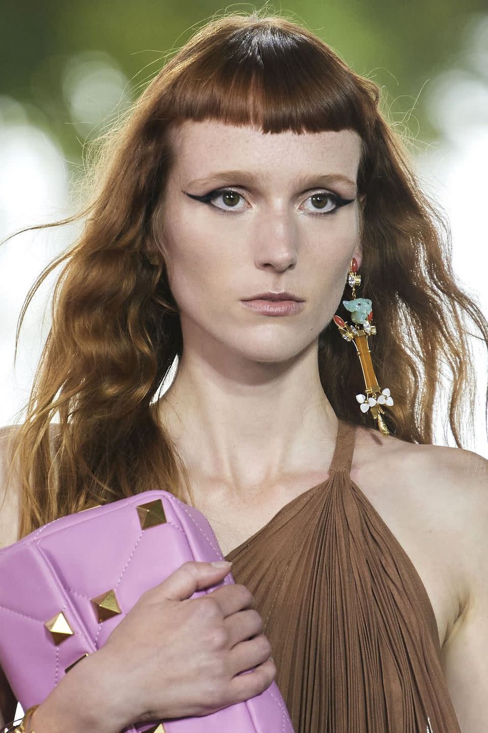 <p>Mis-match your earrings or wear one solo. You'll be right on trend!</p><p><em>Valentino</em> </p>