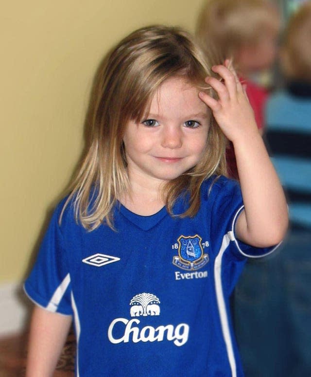 Madeleine McCann wearing a football top.