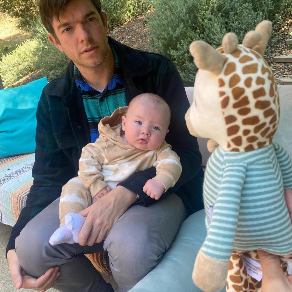 “A giraffe wearing a shirt was really confusing for these two,” the mother of two wrote alongside this photo of John and Malcolm.