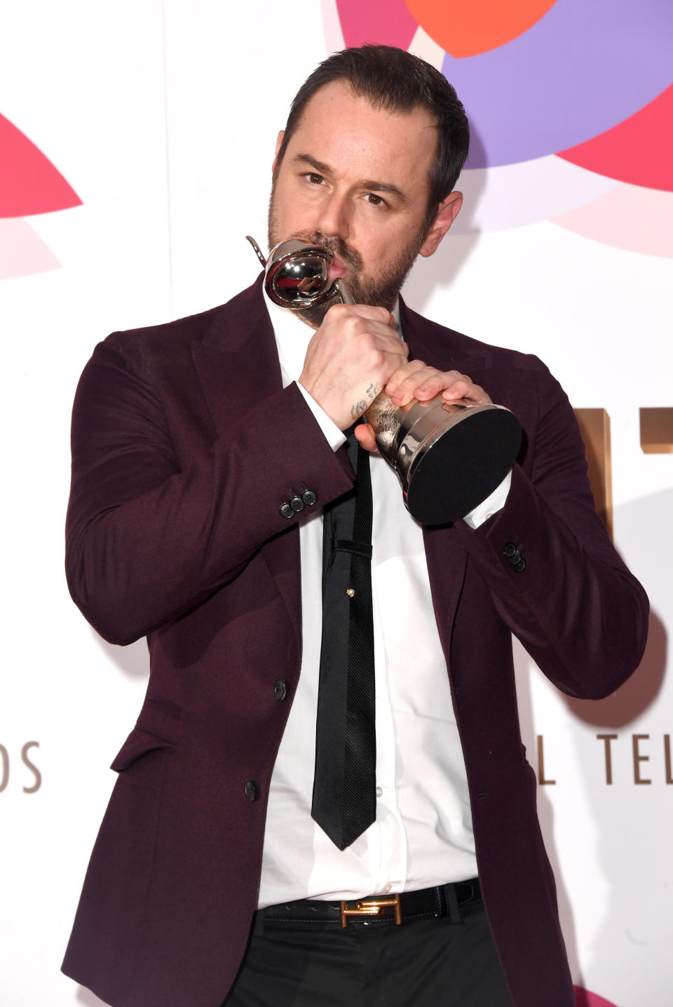 Danny Dyer with the award for Serial Drama Performance (Credit: Stuart C. Wilson/Getty Images)