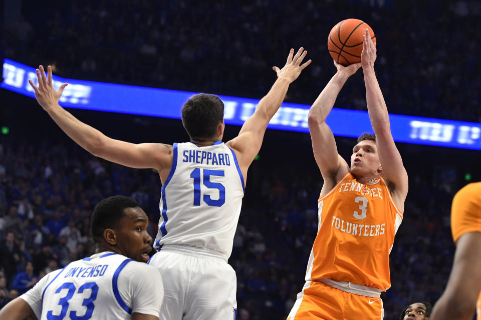 Tennessee guard Dalton Knecht (3) attempts a shot over Kentucky guard Reed Sheppard (15) during the first half of an NCAA college basketball game in Lexington, Ky., Saturday, Feb. 3, 2024. (AP Photo/Timothy D. Easley)