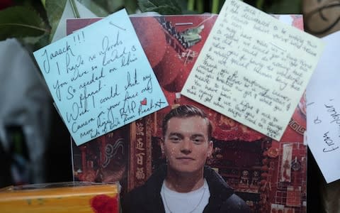 Floral tributes for victims of the terrorist attack, including Jack Merritt, left on London Bridge - Credit: PA&nbsp;