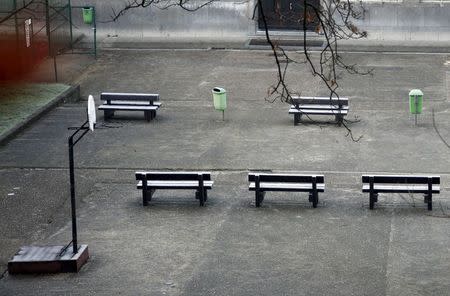 An empty playground is pictured at a closed primary and secondary school in Brussels, November 23, 2015, after security was tightened in Belgium following the fatal attacks in Paris. REUTERS/Francois Lenoir