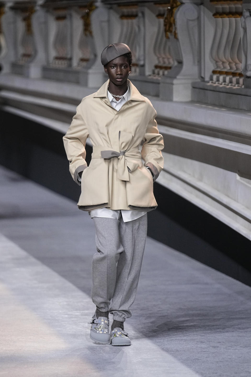 A model wears a creation for the Dior fall-winter 22/23 men's collection, in Paris, Friday, Jan. 21, 2022. (AP Photo/Michel Euler)