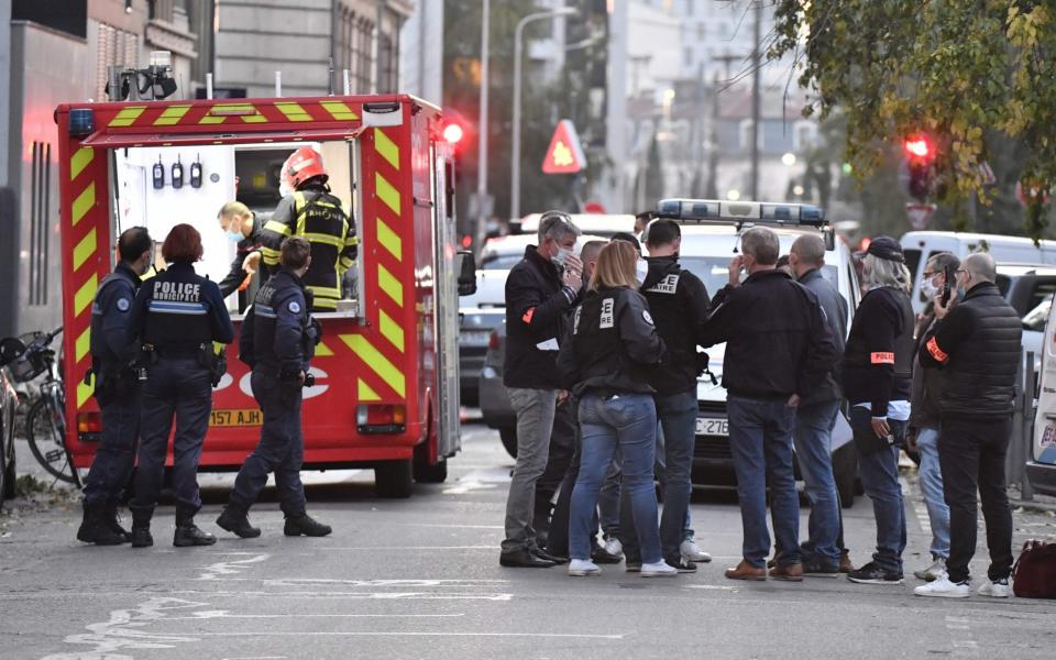 The priest, who has Greek nationality, was closing his church when the attack happened - AFP