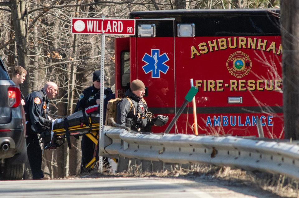 ASHBURNHAM - A man is loaded into an ambulance in the area of Route 101 and Willard Road after a chase and standoff Thursday, March 30, 2023. 