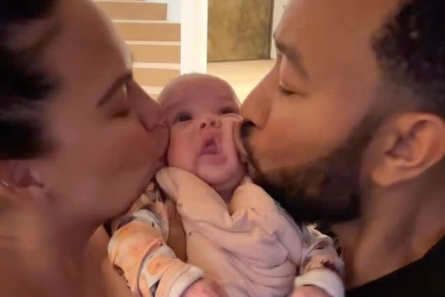 Chrissy Teigen Instagram Chrissy Teigen and John Legend kiss baby daughter Esti on both cheeks