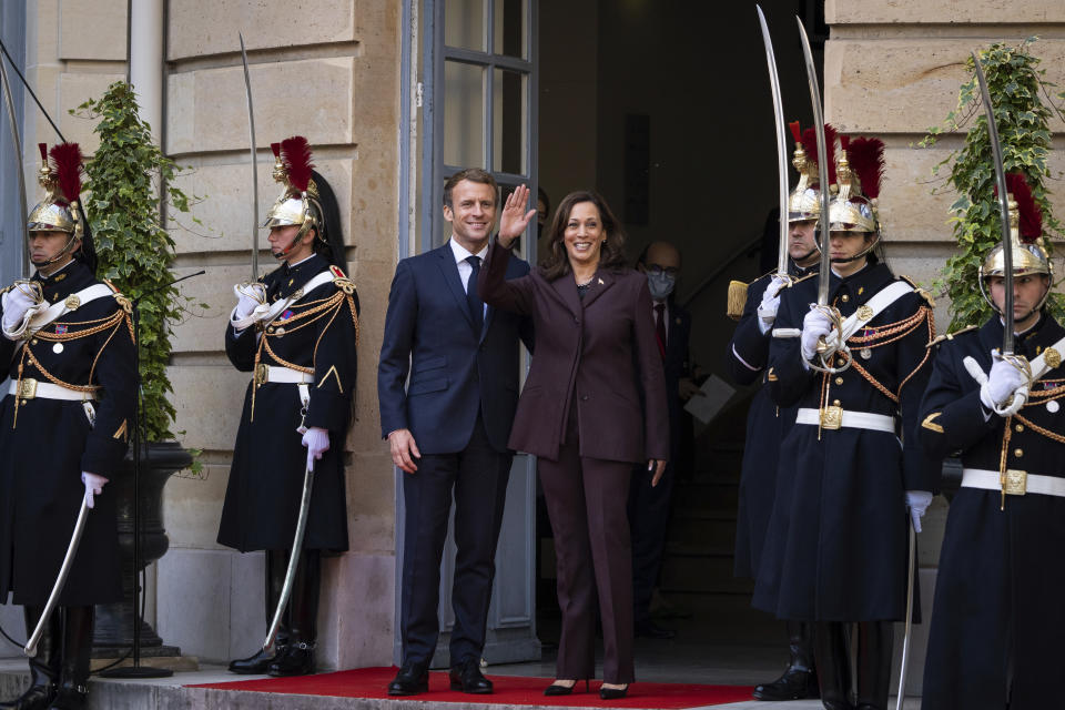 French President Emmanuel Macron, left, welcomes Vice President Kamala Harris to the Paris Conference on Libya in Paris, Friday, Nov. 12, 2021. (Sarahbeth Maney/The New York Times via AP, Pool)