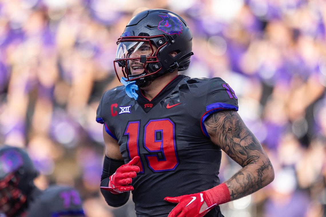 TCU tight end Jared Wiley (19) smiles after running in for a touchdown in the second quarter of a Big XII match up between the TCU Horned Frogs and the Baylor Bears at Amon G. Carter Stadium in Fort Worth on Saturday, Nov. 18, 2023.