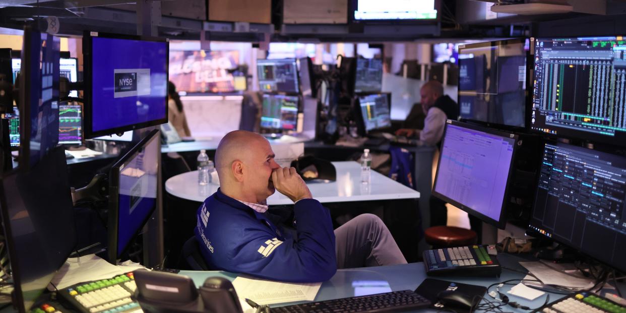 Traders work on the floor of the New York Stock Exchange during afternoon trading on November 03, 2023.