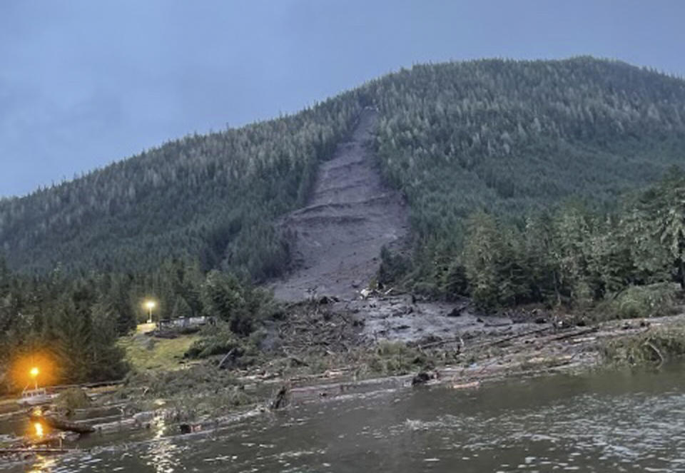 FILE - This photo provided by the Alaska Department of Public Safety shows the landslide that occurred the previous evening near Wrangell, Alaska, Tuesday, Nov. 21, 2023. Authorities recovered the body of Kara Heller, 11, Saturday evening, Nov. 25, from the debris of a landslide in southeast Alaska that tore down a wooded mountainside, smashing into the homes in a remote fishing village Monday night, Nov. 20. The girl is the fourth confirmed killed by the landslide from the Heller family. (Alaska Department of Public Safety via AP, File)