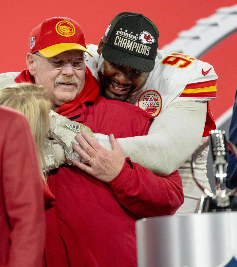 Kansas City Chiefs defensive tackle Chris Jones (95) hugs coach Andy Reid after the Chiefs defeated the Baltimore Ravens 17-10 in the AFC Championship Game on Sunday, Jan. 28, 2024, in Baltimore. Nick Wagner/nwagner@kcstar.com